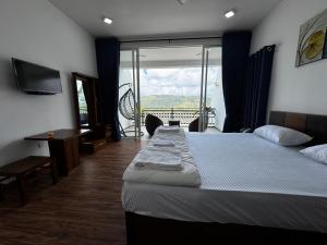 Voodi või voodid majutusasutuse Wooton Peak Resort toas