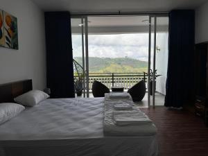 Voodi või voodid majutusasutuse Wooton Peak Resort toas