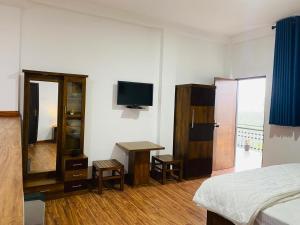 Voodi või voodid majutusasutuse Wooton Peak Resort toas