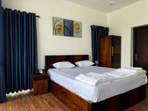 Voodi või voodid majutusasutuse Wooton Peak Resort toas