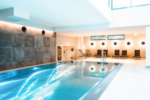 Bazén v ubytování HENRI Country House Kitzbühel nebo v jeho okolí