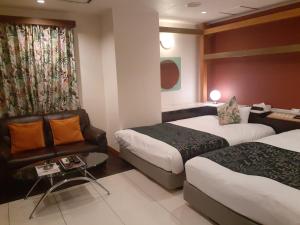 Postel nebo postele na pokoji v ubytování Hotel Moana Otsuka (Adult Only)