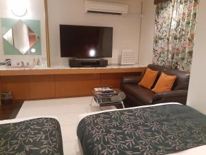 TV a/nebo společenská místnost v ubytování Hotel Moana Otsuka (Adult Only)