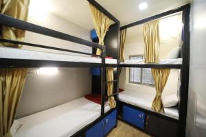 Postel nebo postele na pokoji v ubytování Social Hubz Hostel