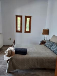 Ένα ή περισσότερα κρεβάτια σε δωμάτιο στο Villa Magnolia
