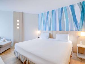 Cama o camas de una habitación en Mercure Rio de Janeiro Barra da Tijuca