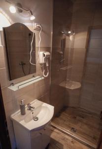 Koupelna v ubytování Megnyugtat-lak Apartmanház