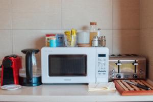 Kuchyňa alebo kuchynka v ubytovaní Megnyugtat-lak Apartmanház