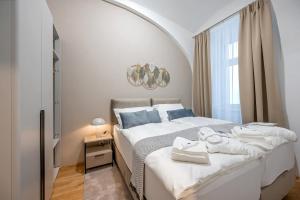 Posteľ alebo postele v izbe v ubytovaní Apartment Luxe - with Aircondition!