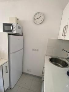 Dapur atau dapur kecil di Oasis Tinache