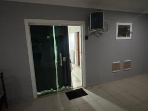 TV a/nebo společenská místnost v ubytování Suíte Privativa Completa