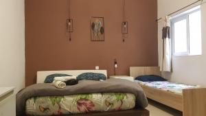 Voodi või voodid majutusasutuse Central Sliema Stay Cozy for 4 guests, Air-Conditioned, Self Check-In toas