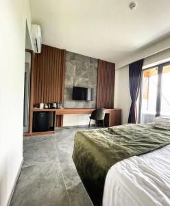 TV a/nebo společenská místnost v ubytování Lastiver Resort