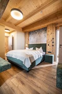 Postel nebo postele na pokoji v ubytování Studio 24 by Hotel Brücke