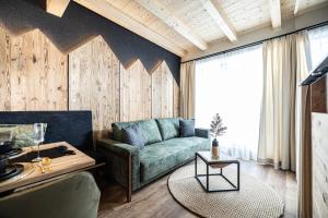 Posezení v ubytování Studio 24 by Hotel Brücke