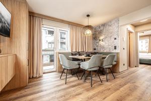 TV a/nebo společenská místnost v ubytování Studio 24 by Hotel Brücke