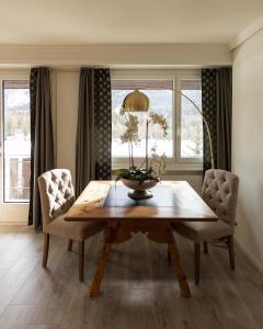 Χώρος καθιστικού στο Hotel Europa Suites St Moritz