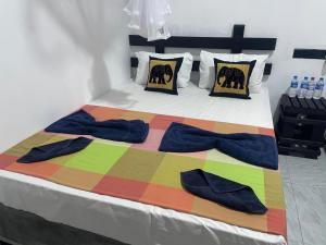 Ένα ή περισσότερα κρεβάτια σε δωμάτιο στο Yashi's Place Sigiriya