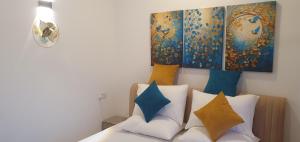 Postel nebo postele na pokoji v ubytování Colombo Flemington Apartments