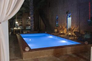 Bazén v ubytování Hotel Riad Sahara Activity nebo v jeho okolí