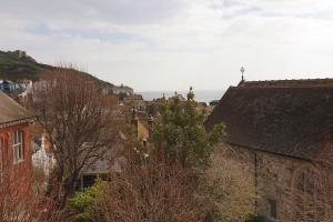 a view of a city with buildings and trees at Stanhope House in Hastings