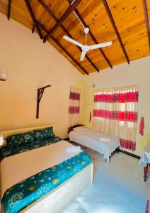 Postel nebo postele na pokoji v ubytování MALWATHTHA MOUNT VILLA KANDY