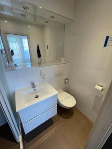 Ein Badezimmer in der Unterkunft Hotel SPECTRUM