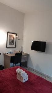 TV a/nebo společenská místnost v ubytování Rainbow Sweet Rooms