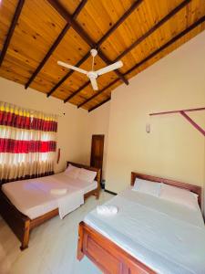 Postel nebo postele na pokoji v ubytování MALWATHTHA MOUNT VILLA KANDY