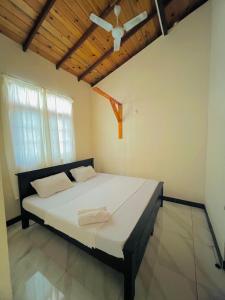 Postel nebo postele na pokoji v ubytování MALWATHTHA MOUNT VILLA KANDY