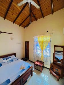 Postel nebo postele na pokoji v ubytování MALWATHTHA MOUNT VILLA KANDY