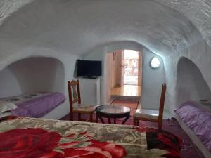Postel nebo postele na pokoji v ubytování Hotel diar Matmata diar barbar