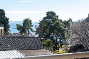 a view of the ocean from a roof at Apartment Bazen in Zadar
