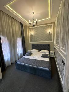 Letto o letti in una camera di Hotel Roma & Tours