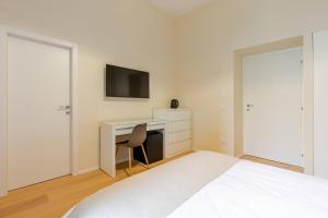 TV a/nebo společenská místnost v ubytování Ripetta Views Luxury room and suite