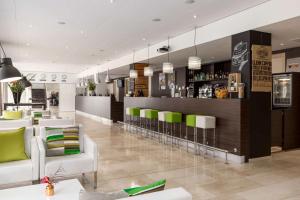 De lounge of bar bij NH Amsterdam Zuid
