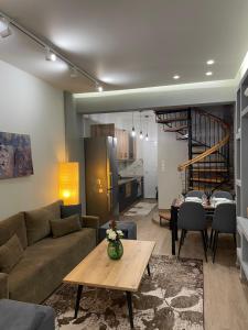 Et opholdsområde på Amy's Comfort Maisonette