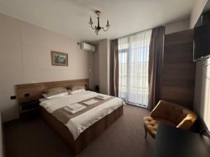Postel nebo postele na pokoji v ubytování Riva + 37 fotografií