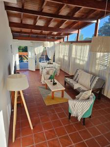 a living room with a couch and a table at Casa Montana in Potrero de Garay