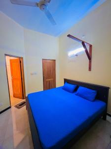 Postel nebo postele na pokoji v ubytování MALWATHTHA MOUNT VILLA KANDY