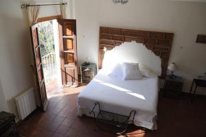 Postel nebo postele na pokoji v ubytování Hotel Humaina