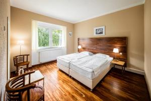 Postel nebo postele na pokoji v ubytování Resort Svata Katerina