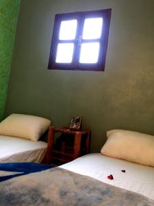 Postel nebo postele na pokoji v ubytování Gite entre les deux vallées + 37 fotografií