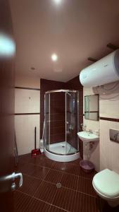Ένα μπάνιο στο Florimont Heights Apart Complex