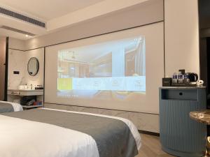 Lijiang MΛISON Hotel客房内的一张或多张床位