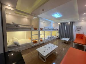 Kuchyň nebo kuchyňský kout v ubytování Rangya Hotel