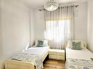 Ένα ή περισσότερα κρεβάτια σε δωμάτιο στο Sunny Beach Apartments - 147
