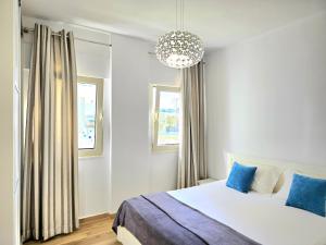 Ένα ή περισσότερα κρεβάτια σε δωμάτιο στο Sunny Beach Apartments - 147