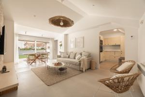 a living room with a couch and a table at A Casiña in Nigrán