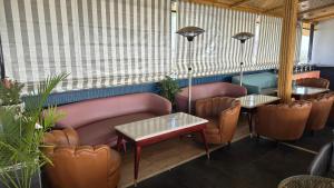 Posezení v ubytování Grace Inn Hotel Dehradun